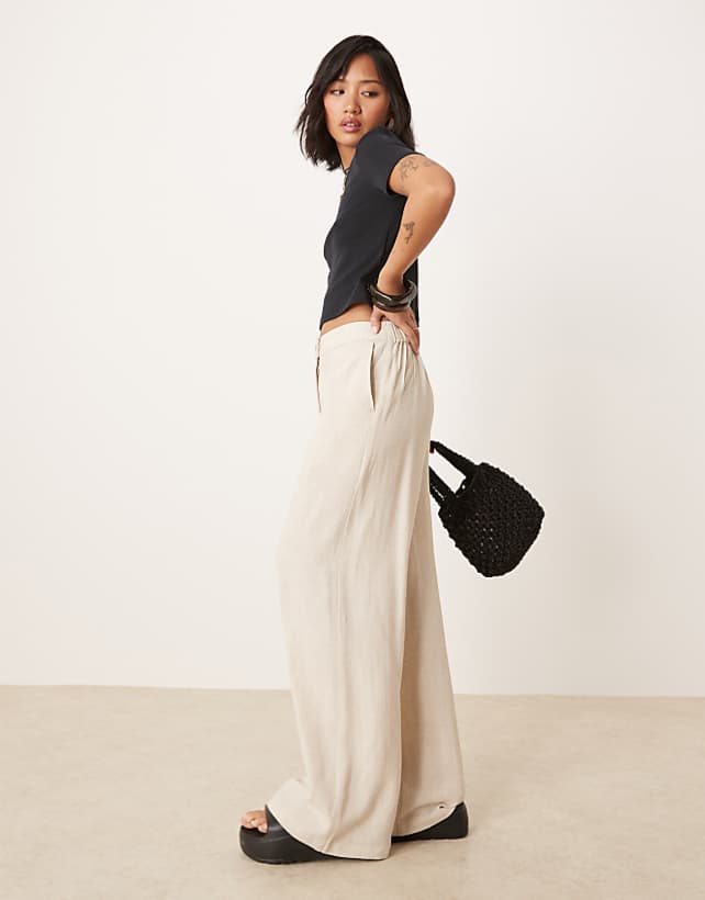 asos ASOS DESIGN Petite relaxed straight leg trousers with linen in natural