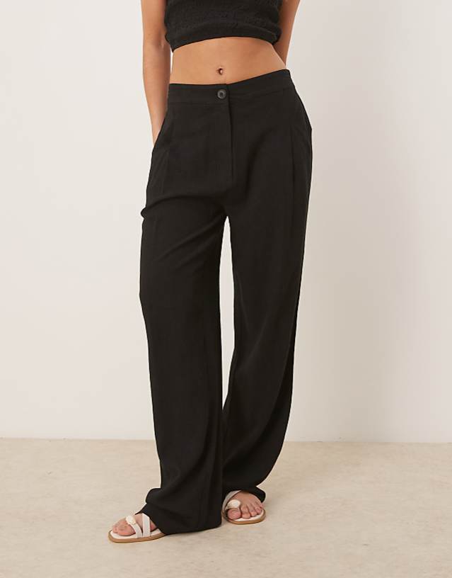 asos ASOS DESIGN pleat front tapered trousers with linen in black