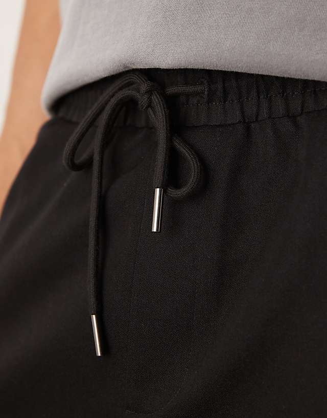 Asos ASOS DESIGN Pull On Smart Tapered Fit Trousers In Black
