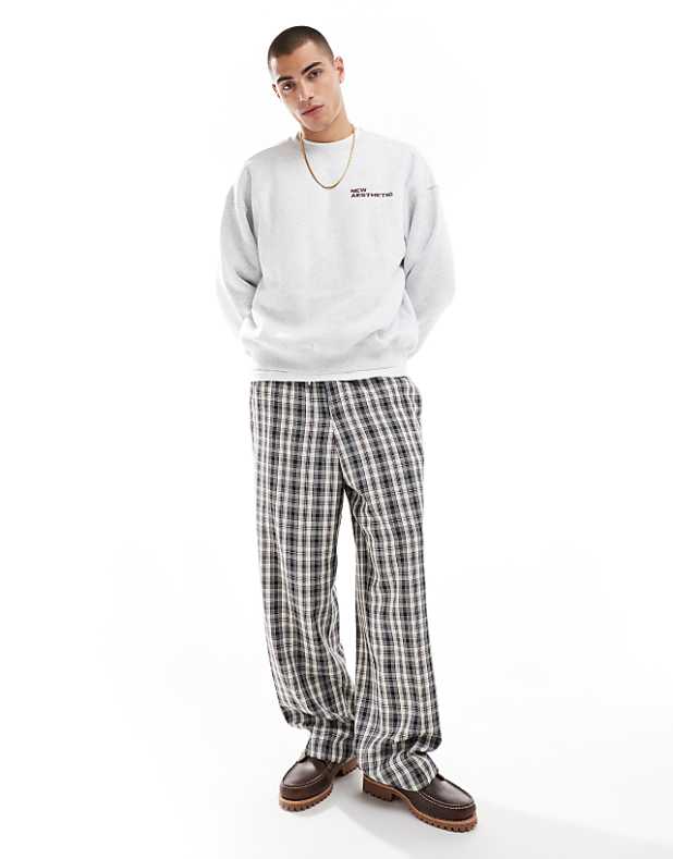 asos ASOS DESIGN pull on smart wide leg check trousers in black