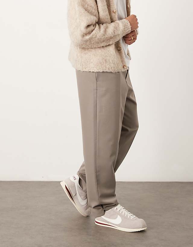 Asos ASOS DESIGN Pull On Smart Wide Leg Trousers With Hem Poppers In Muted Khaki