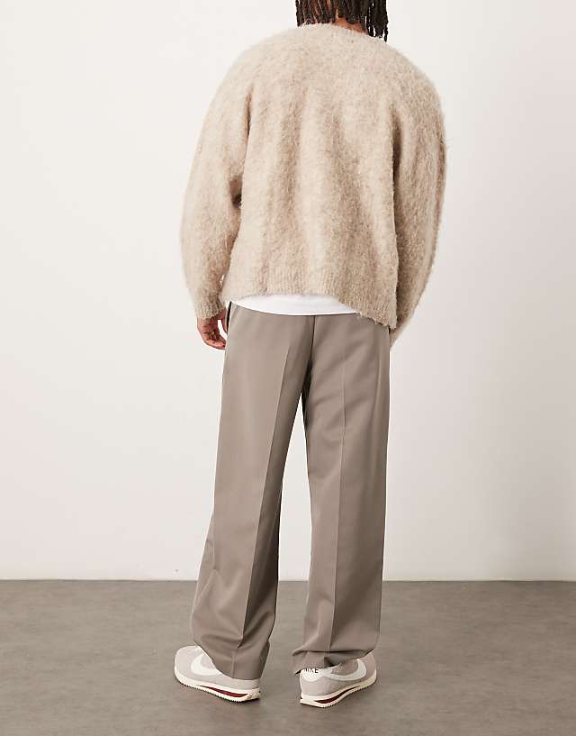 Asos ASOS DESIGN Pull On Smart Wide Leg Trousers With Hem Poppers In Muted Khaki