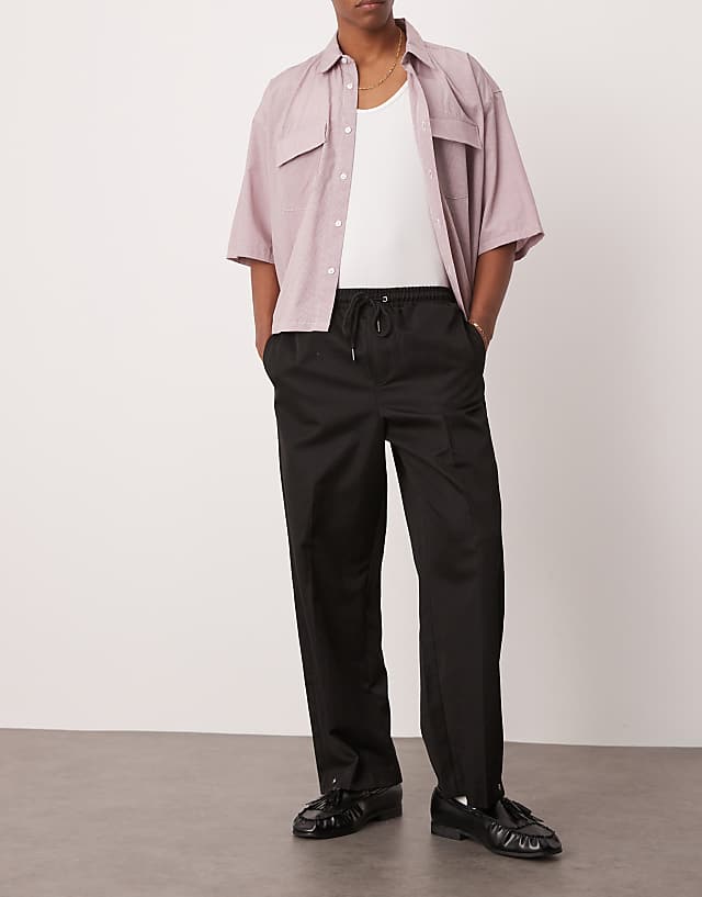 Asos ASOS DESIGN Pull On Smart Wide Leg Trousers With Hem Poppers In Black
