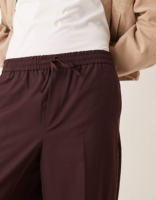Asos ASOS DESIGN Pull On Smart Wide Leg Trousers With Side Piping In Burgundy