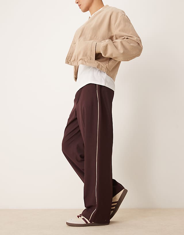 asos ASOS DESIGN pull on smart wide leg trousers with side piping in burgundy