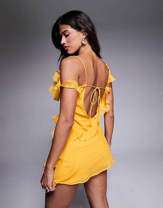 Asos ASOS DESIGN Raw Edge Frill Mini Dress With Tie Back In Yellow