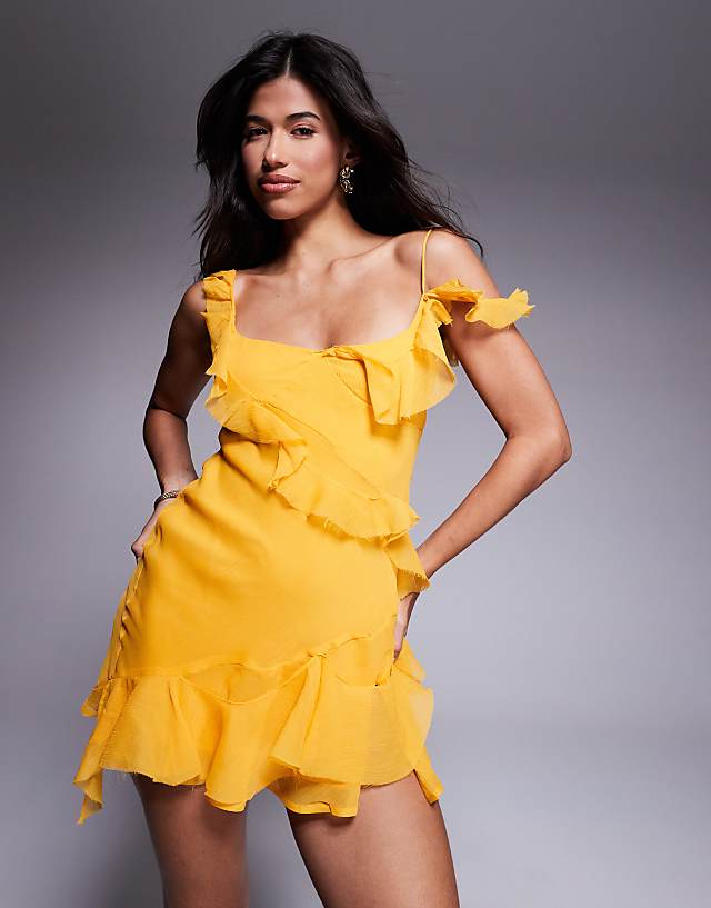 asos ASOS DESIGN raw edge frill mini dress with tie back in yellow