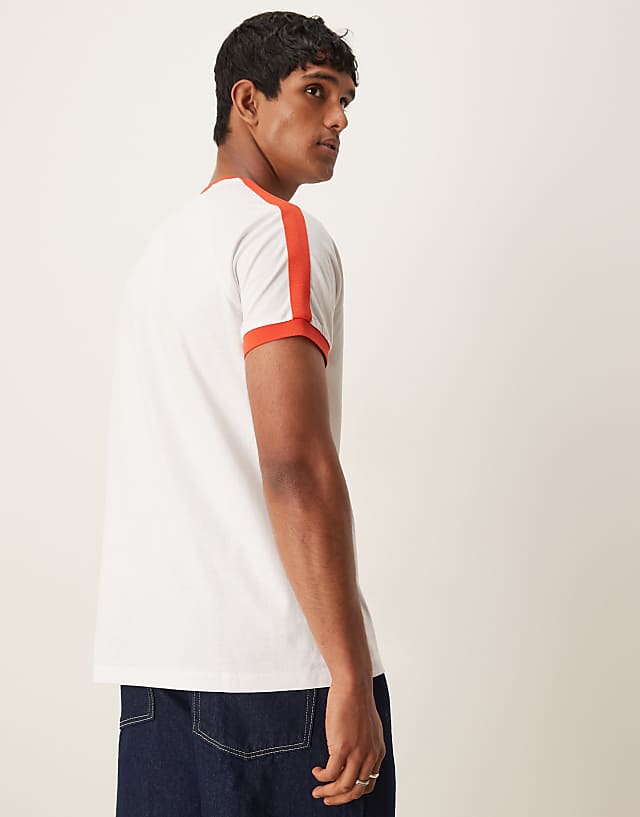 Asos ASOS DESIGN Relaxed Raglan T-shirt With Contrast Collar And City Graphic In White