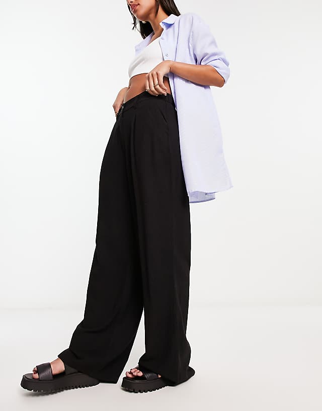 asos ASOS DESIGN relaxed straight leg trousers with linen in black