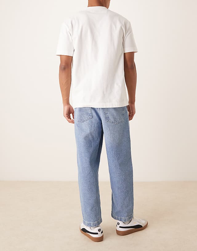 Asos ASOS DESIGN Relaxed Tapered Jeans In Light Wash Blue