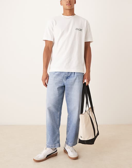 asos ASOS DESIGN relaxed tapered jeans in light wash blue