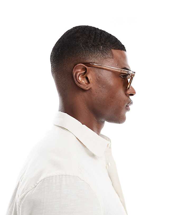 Asos ASOS DESIGN Round Sunglasses In Brown With Black Lens