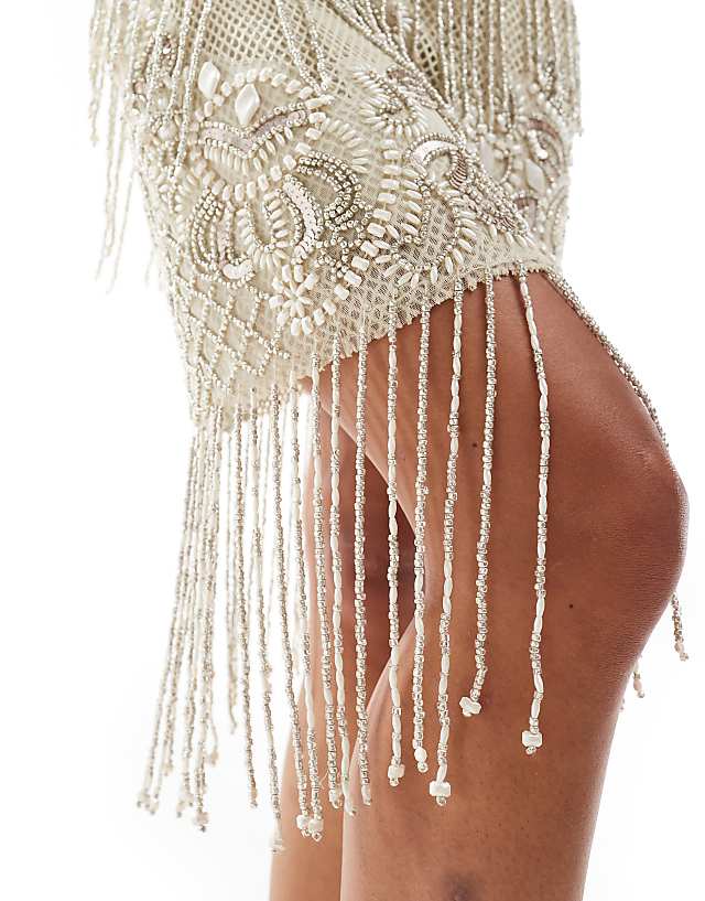 Asos ASOS DESIGN Scoop Neck Crochet Fringe Embellished Mini Dress With Asymmetric Hem In Cream