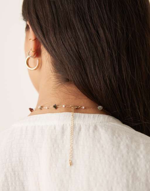 Asos ASOS DESIGN Short Necklace With Mixed Sized Semi Precious Chippings In Gold Tone
