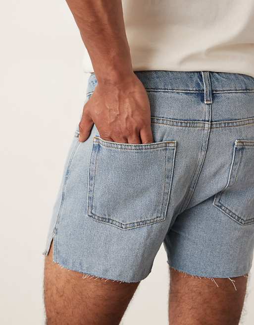 Asos ASOS DESIGN Shorter Length Slim Denim Shorts With Rip Detail In Light Wash Blue