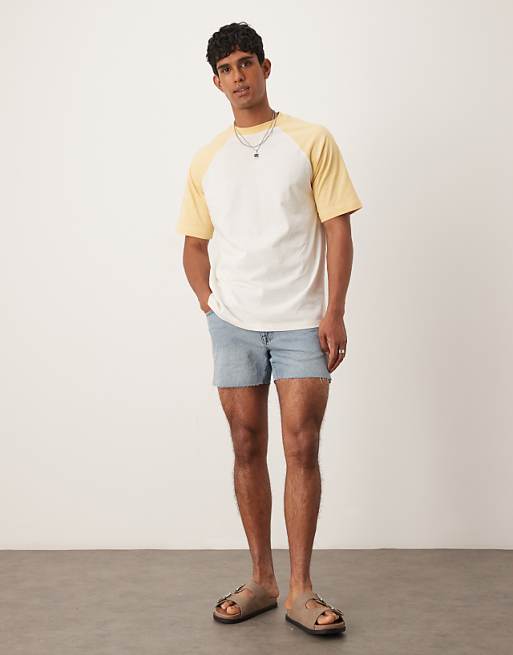 asos ASOS DESIGN shorter length slim denim shorts with rip detail in light wash blue