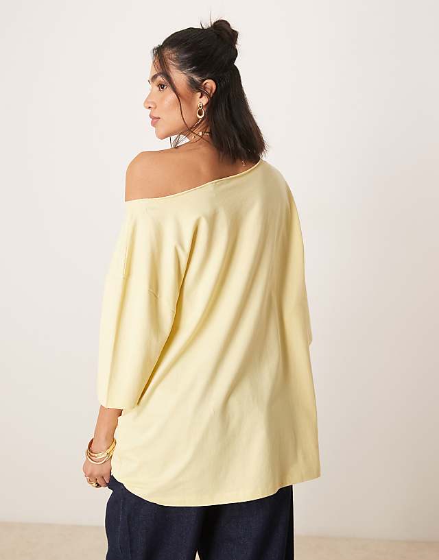 Asos ASOS DESIGN Slouchy Off Shoulder Oversized Tee In Buttermilk