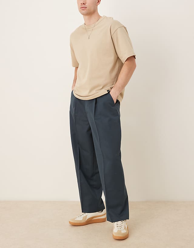 Asos ASOS DESIGN Smart Balloon Fit Trousers With Front Pleat In Dark Blue