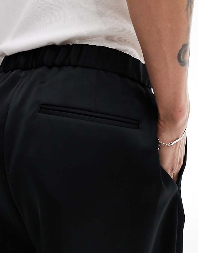 Asos ASOS DESIGN Smart Co-ord Oversized Tapered Trousers In Black Satin With Elasticated Waist