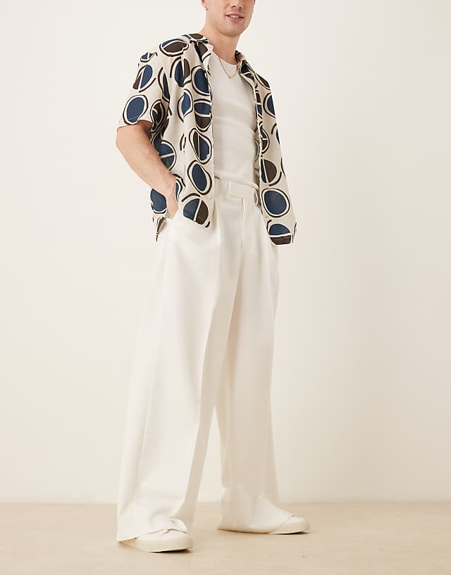 Asos ASOS DESIGN Smart Loose Fit Trousers With Front Pleats In White