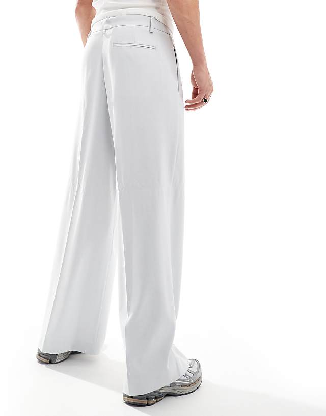 Asos ASOS DESIGN Smart Loose Leg Trouser With Pleats In Light Blue