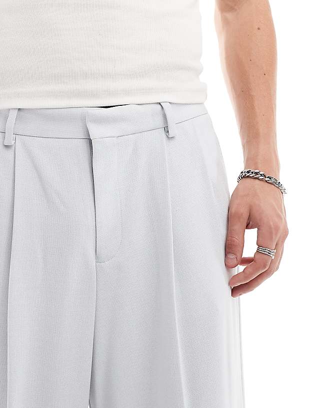 Asos ASOS DESIGN Smart Loose Leg Trouser With Pleats In Light Blue