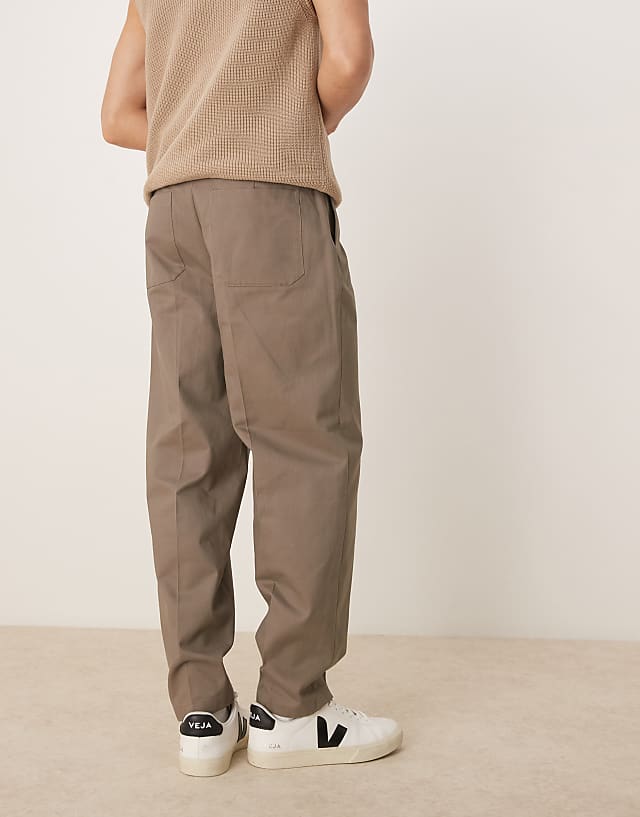Asos ASOS DESIGN Smart Oversized Tapered Cotton Chino Trousers With Side Adjusters In Khaki