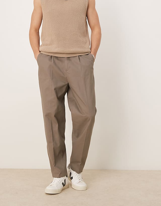 asos ASOS DESIGN smart oversized tapered cotton chino trousers with side adjusters in khaki