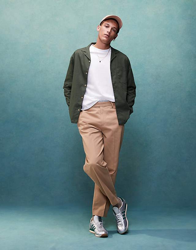 Asos ASOS DESIGN Smart Oversized Tapered Cotton Chino Trousers With Front Pleat In Tan