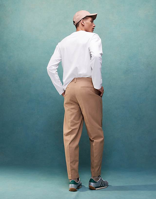 Asos ASOS DESIGN Smart Oversized Tapered Cotton Chino Trousers With Front Pleat In Tan