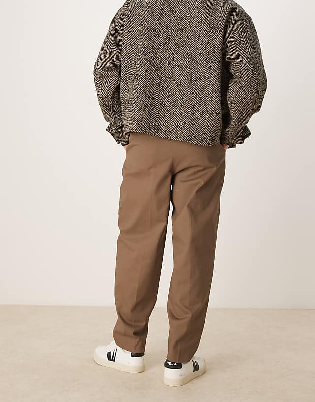 Asos ASOS DESIGN Smart Oversized Tapered Cotton Chino Trousers With Front Pleat In Khaki