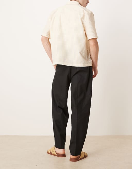 Asos ASOS DESIGN Smart Oversized Tapered Linen Blend Trousers With Front Pleat In Black
