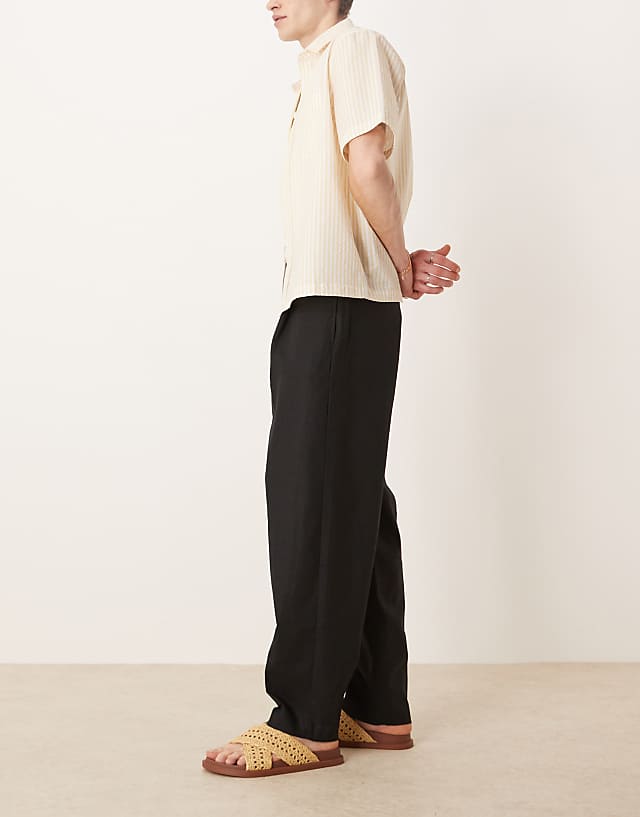 Asos ASOS DESIGN Smart Oversized Tapered Linen Blend Trousers With Front Pleat In Black