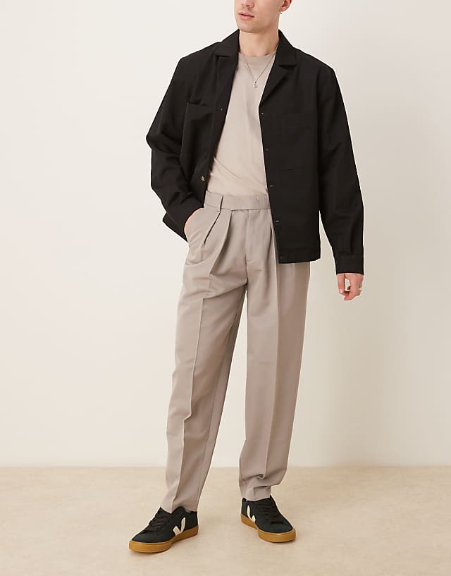 asos ASOS DESIGN smart oversized tapered trousers with double pleats and back pocket detail in stone