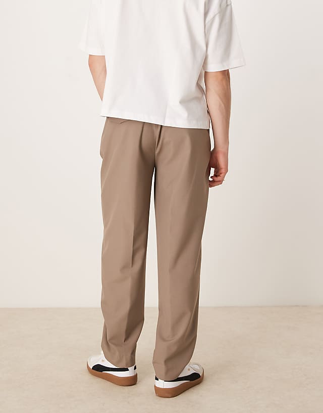 Asos ASOS DESIGN Smart Oversized Tapered Trousers With Deep Pleat In Tan