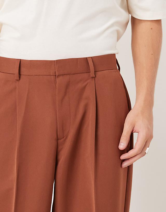 Asos ASOS DESIGN Smart Oversized Tapered Trousers With Front Pleat In Rust
