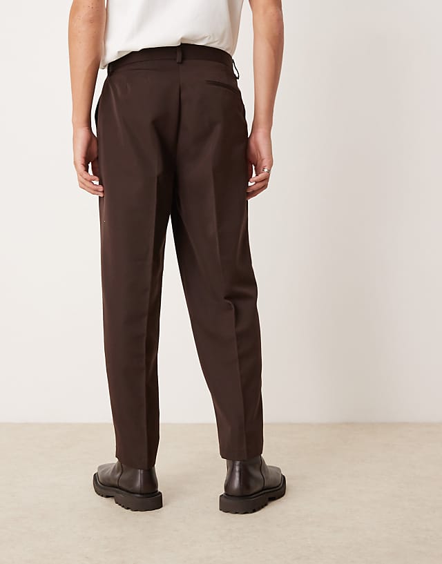 Asos ASOS DESIGN Smart Oversized Tapered Trousers With Front Pleat In Brown