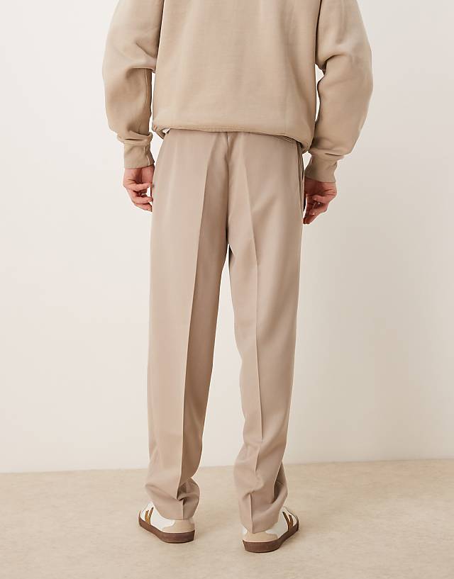 Asos ASOS DESIGN Smart Oversized Tapered Trousers With Front Pleat In Stone