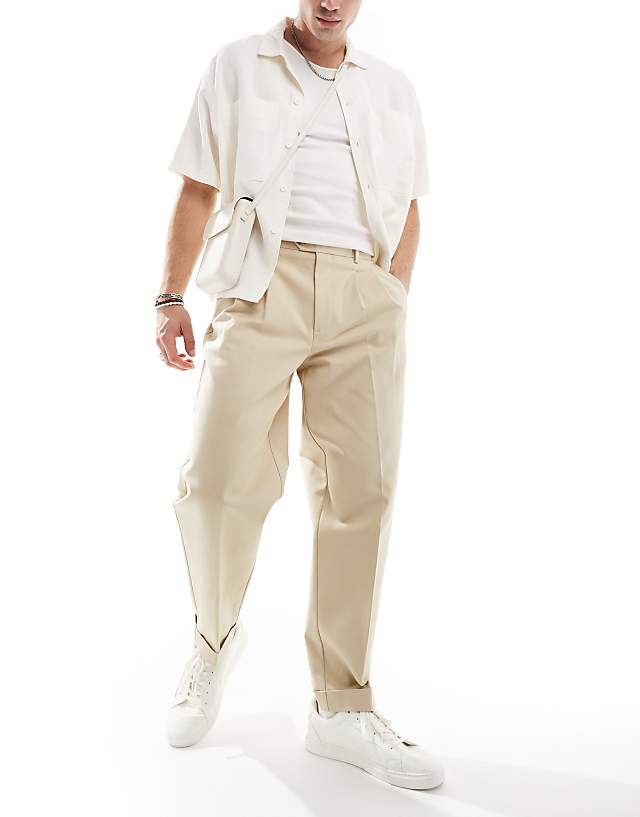 Asos ASOS DESIGN Smart Premium Cotton Oversized Tapered Chino Trousers In Stone