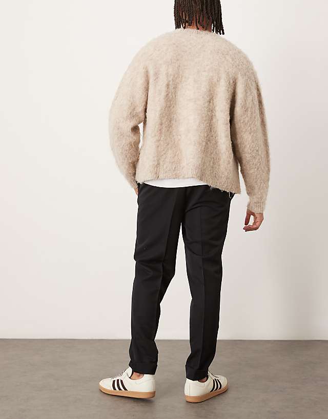 Asos ASOS DESIGN Smart Tapered Fit Trousers With Turnups In Black With Elasticated Waist