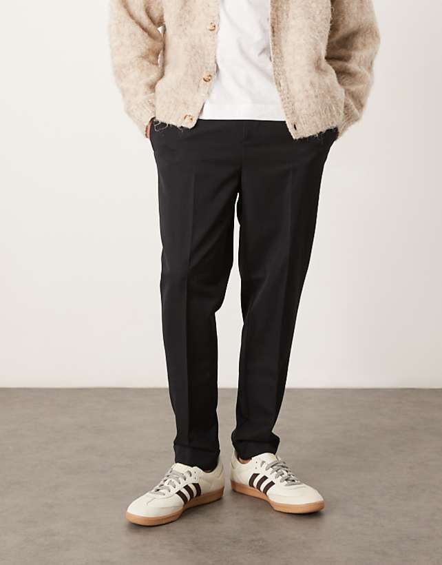 asos ASOS DESIGN smart tapered fit trousers with turnups in black with elasticated waist
