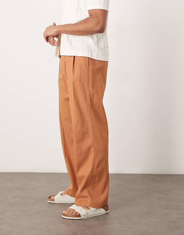 asos ASOS DESIGN smart wide leg linen blend trousers with double pleats in rust