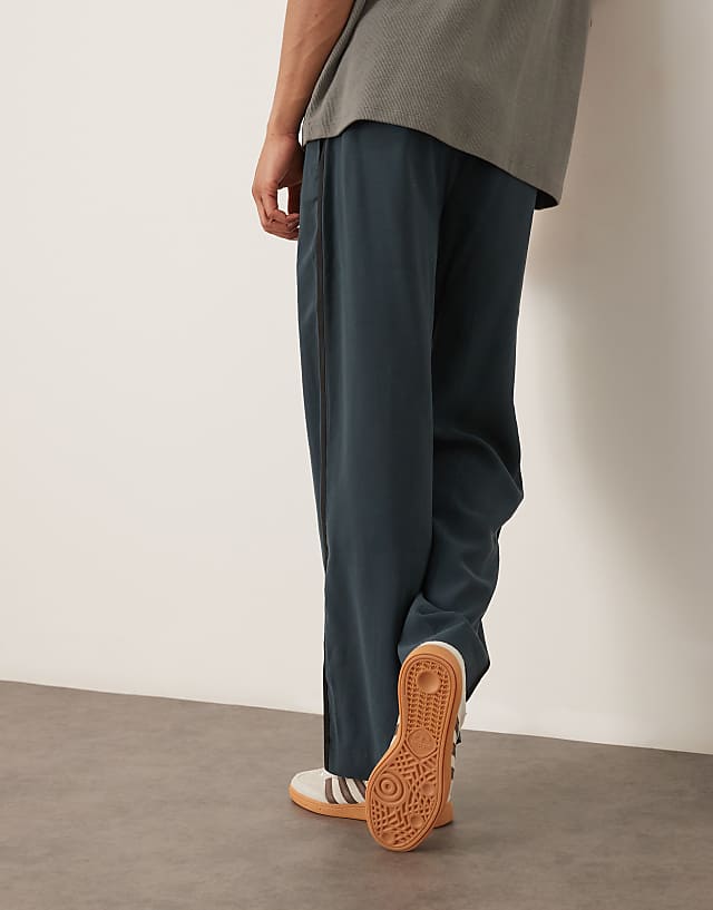 Asos ASOS DESIGN Smart Wide Leg Trousers In Dark Blue With Elasticated Waist And Side Stripes