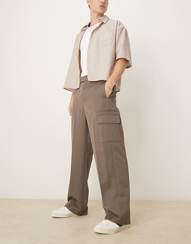 asos ASOS DESIGN smart wide leg trousers with double pleats and cargo pockets in khaki with elasticated waist