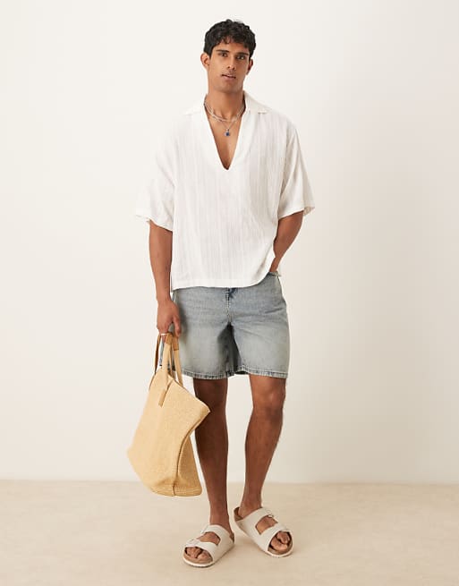 Asos ASOS DESIGN Standard Length Denim Jort In Light Wash