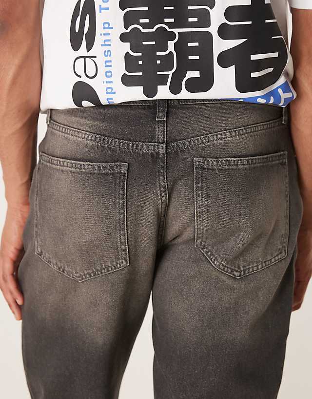 Asos ASOS DESIGN Straight Leg Jeans With Rips In Mid Wash