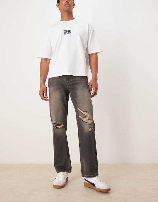 asos ASOS DESIGN straight leg jeans with rips in mid wash