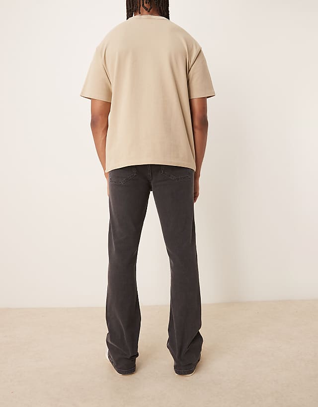 Asos ASOS DESIGN Stretch Flared Jeans In Washed Black