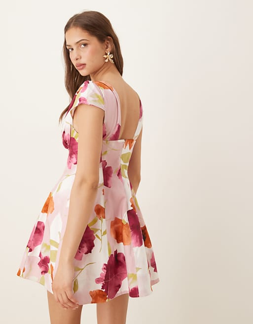Asos ASOS DESIGN Structured Bust Seam Detail Cap Sleeve Mini Dress In Vibrant Abstract Print