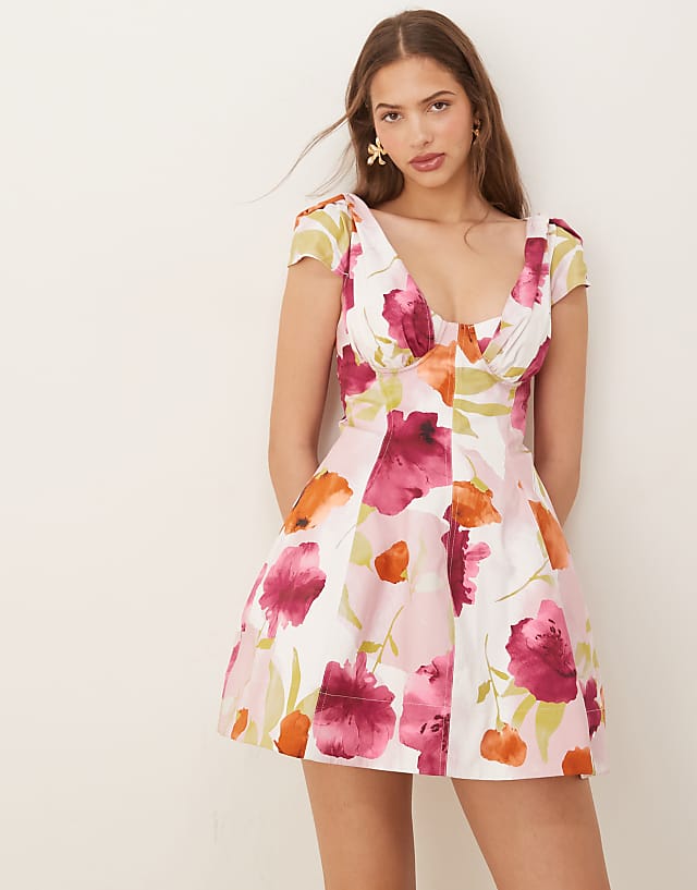 asos ASOS DESIGN structured bust seam detail cap sleeve mini dress in vibrant abstract print